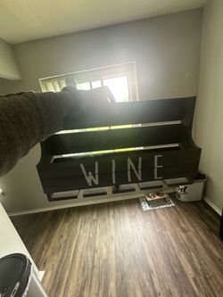 Rustic wall-mounted wine rack