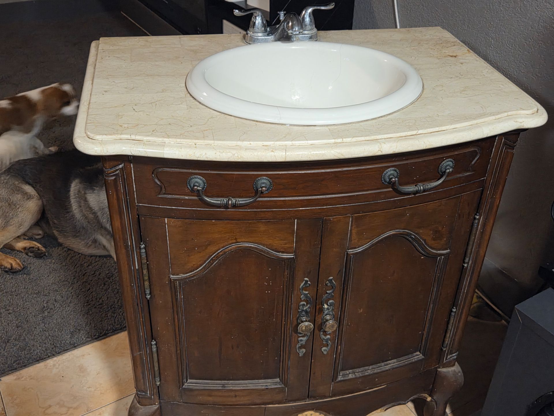 Bathroom - Granite top with sink and faucet.