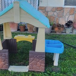 Step2 / Little Tikes outdoor playhouse with a water/sand table attachment