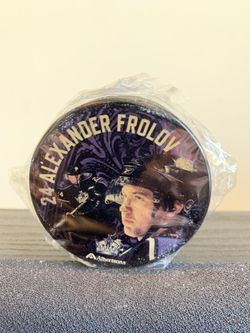 LOS ANGELES KINGS NHL ALEXANDER FROLOV #24 PUCK