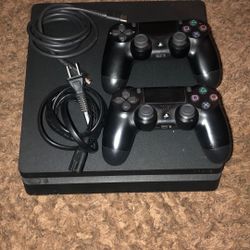PS4 Slim + Controllers And Games 