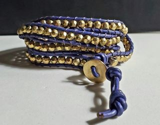 Florence Scoval hand made golden gold beads wrapped with purple leather with 3 adjustable closures measures 32", 33", 34"