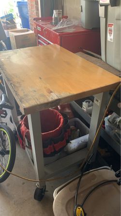 Steel work table on wheels