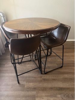 Bar height table and 4 barstools