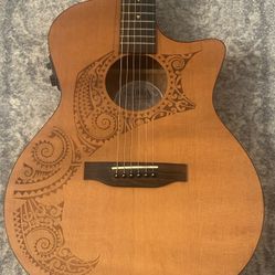 Luna OCL TAT CDR Acoustic Electric Guitar Cedar Top. Mahogany back and sides. Has built in pickup, EQ, Volume control and tuner. Had repair where the 