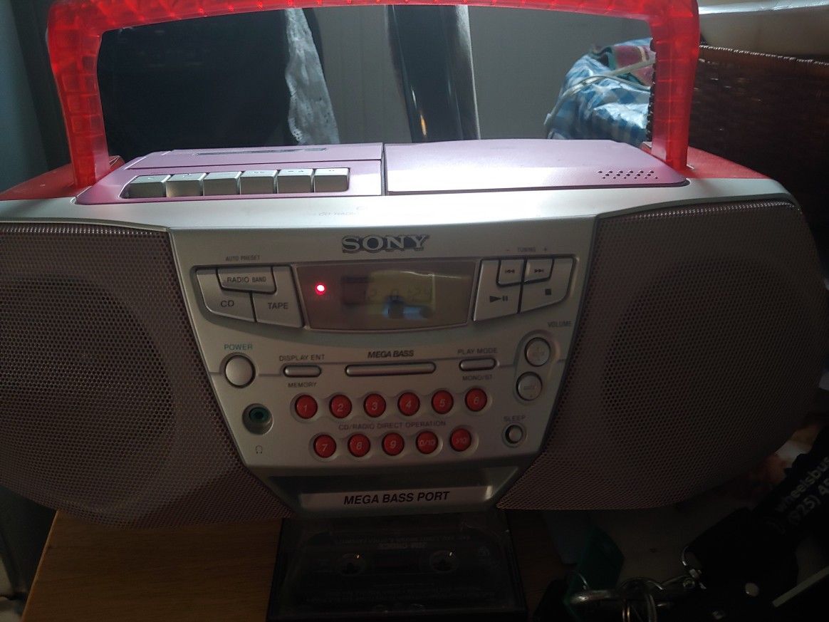 SONY. CD AND TAPE PLAYER IN RED