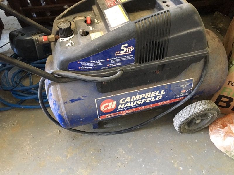 Portable Air Compressor Campbell Hausfeld 13 Gallon, 5 HP, Model Number WL650000AJ 125 PSI. Works Great! Comes With 25-50' Of Air Hose With Fittings.