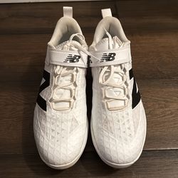 New Balance metal cleats Size 13