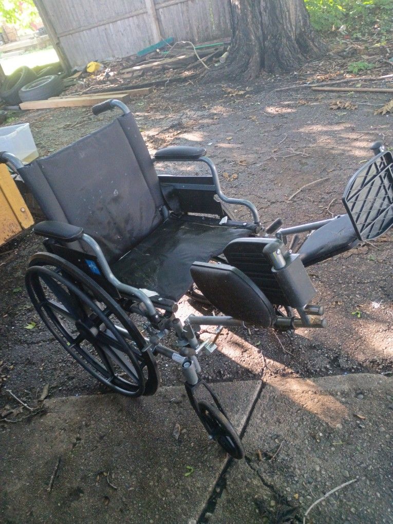 Wheelchair With Leg Extensions