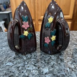 Vintage Red Clay Irons Brown Glossy with Flowers pair of salt and pepper shakers.  Size approximately 4 3/4 inches tall.  Preowned 