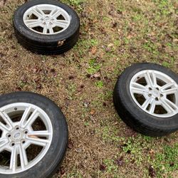 ford alloy oem with rims and tires