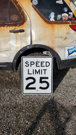 Speed limit sign 25 mph street