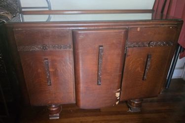 Tigers Eye Antique Dresser With Rolling Tires, Plus Glass On Top For Extra Protection.