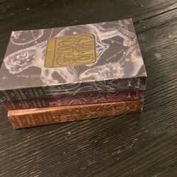 The Golden Compass, The Subtle Knife, The Amber Spyglass 