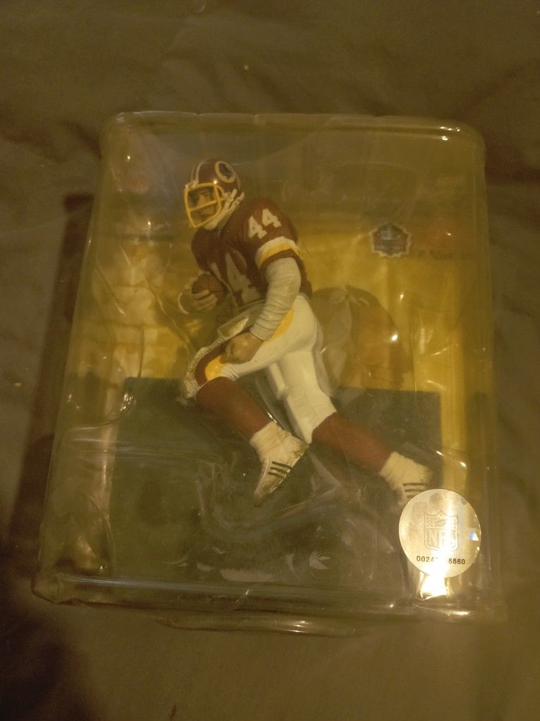 Running Back John "Riggo" Riggins.  Washington Redskins.  Excellent Condition Never Taken Out Of Box