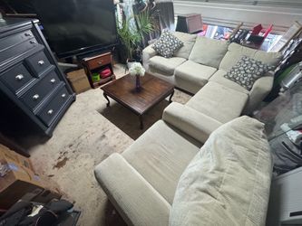 Couch, chair with ottoman , and coffee table