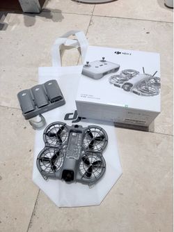 NIB DJI NEO2 with remote and batteries