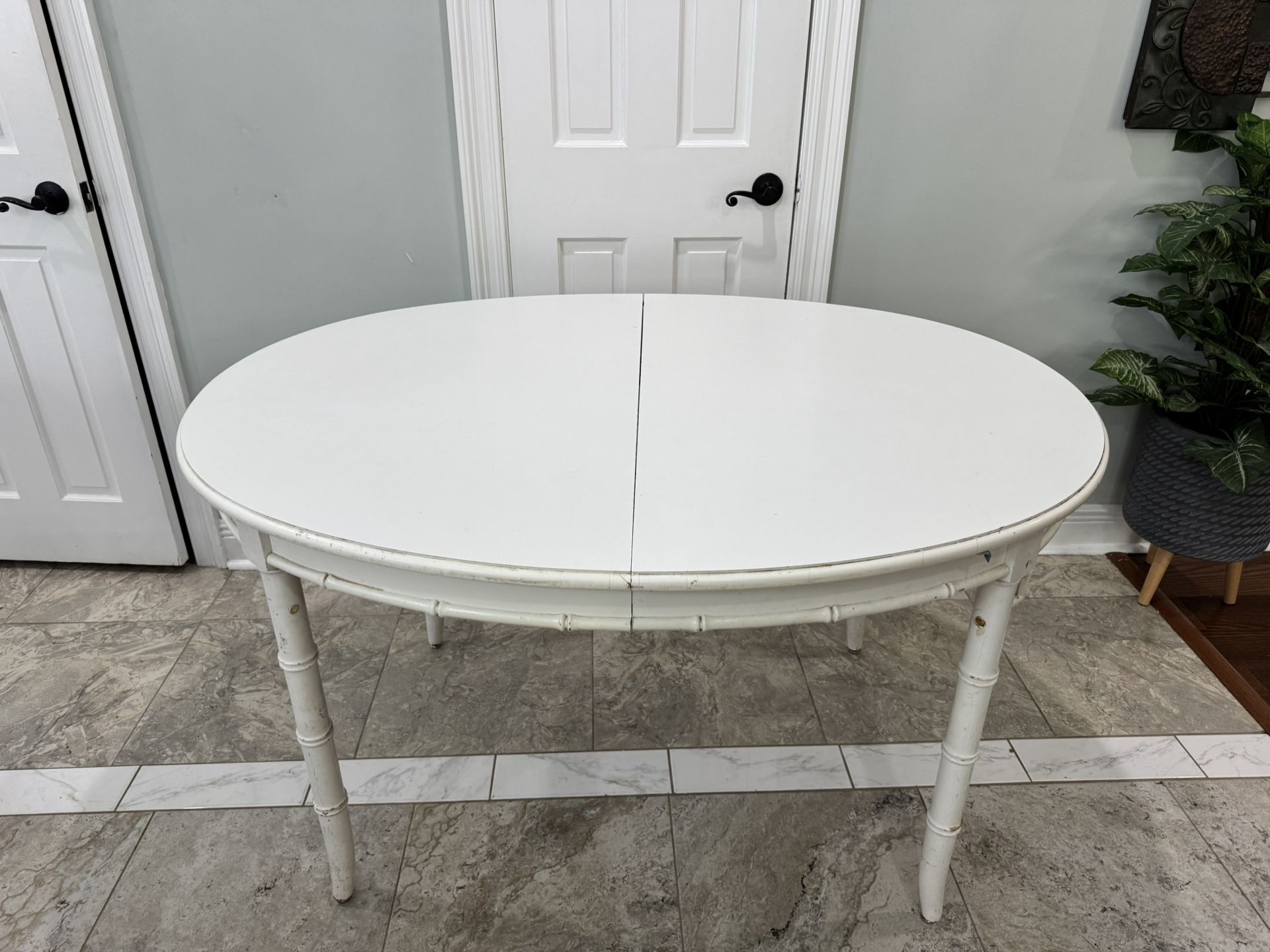 Stirdy wood oval dining table selling as is