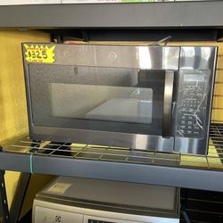 New GE Over The Range Microwave