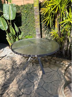 Tropitone 48” glass top patio table