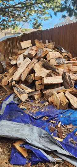 Fire Wood For Sale By The Level Wheel Barrow
