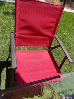 Patio table with chairs and umbrella