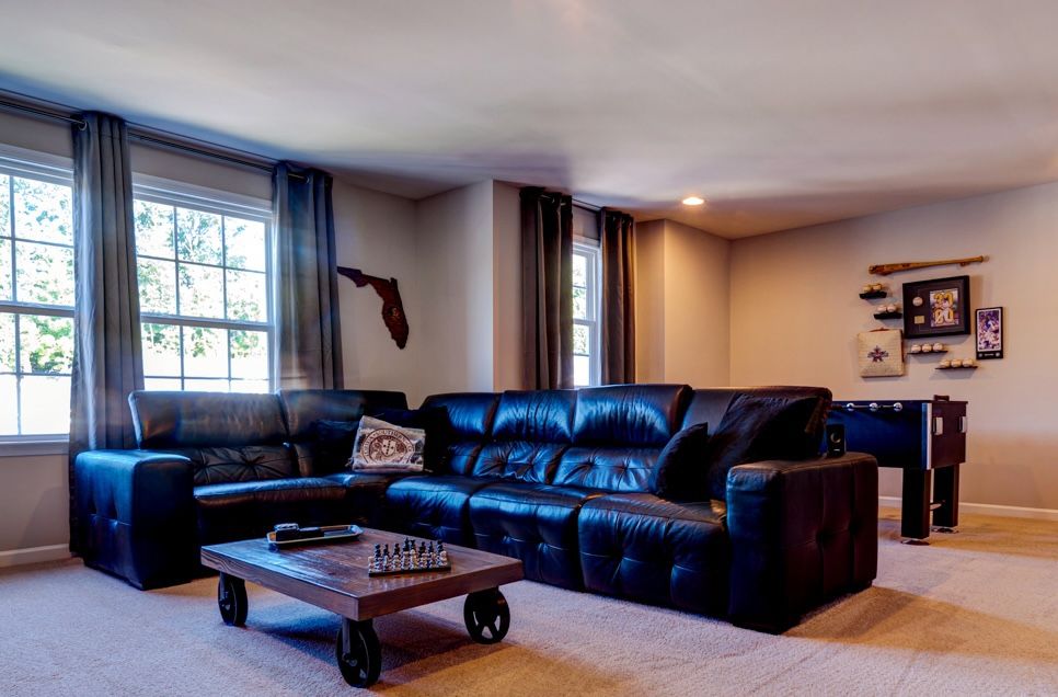 Z-Gallerie Five Piece Black Leather Sectional - with three recliners