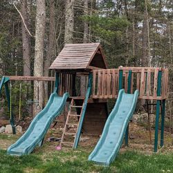 Swingset With 2 Slides, Climbing Wall And Playhouse