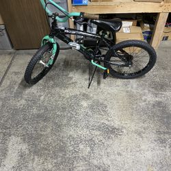 18-inch Dynacraft Next Surge Boys' BMX Bike in black and green