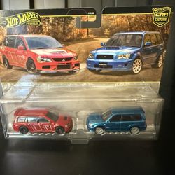 Hot Wheels Premium '05 Mitsububishi Lancer Evolution IX / '04 Subaru STI  1:64