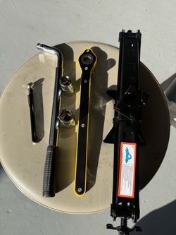 Emergency wheel kit with ear wrench