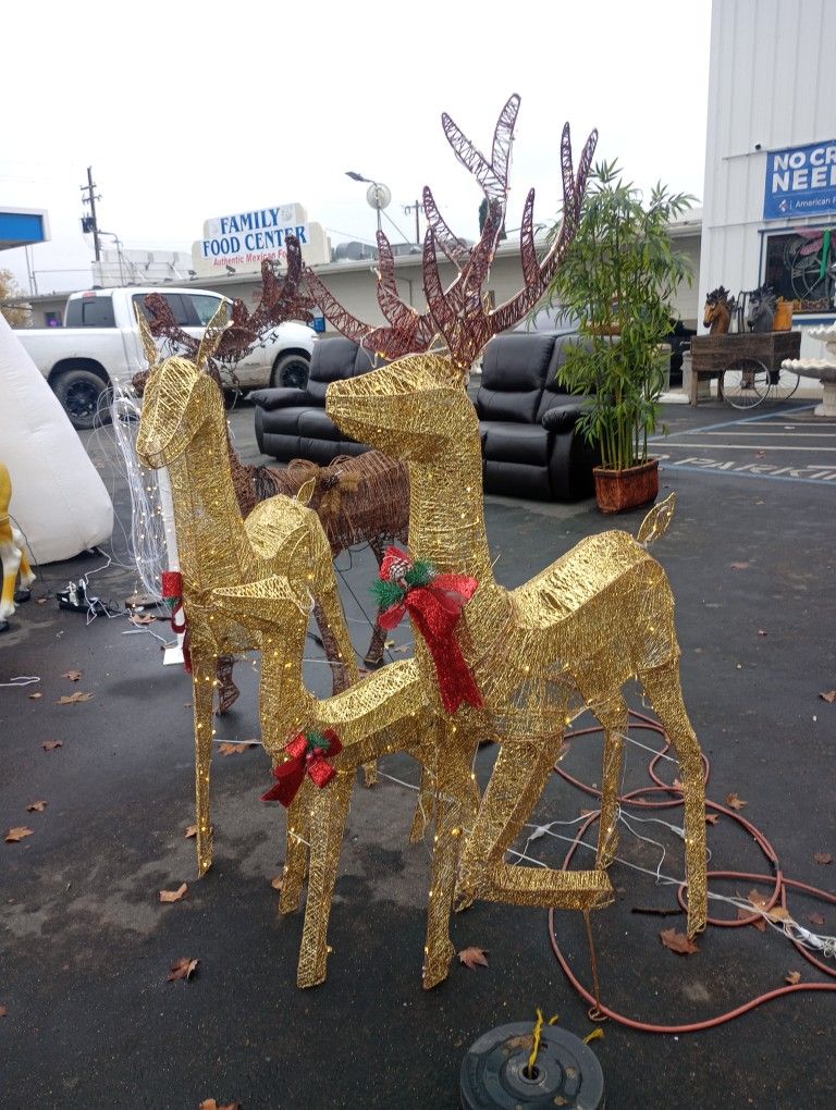 Reindeer Family, Tree With Decorations And Lawn Ornaments