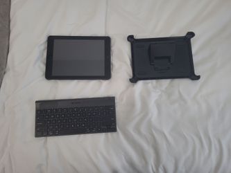 I Pad with otter case and Logitech keyboard