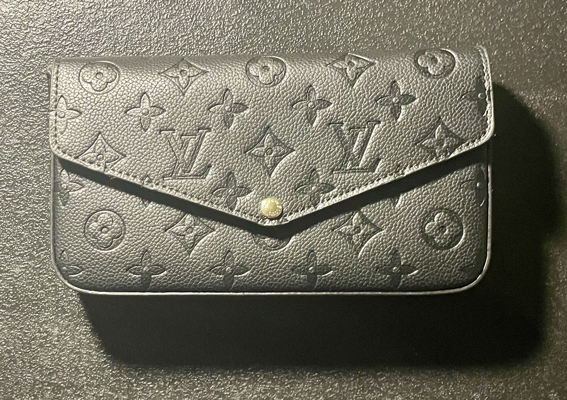 Louis Vuitton Félicie Pochette in Black Monogram Empreinte leather