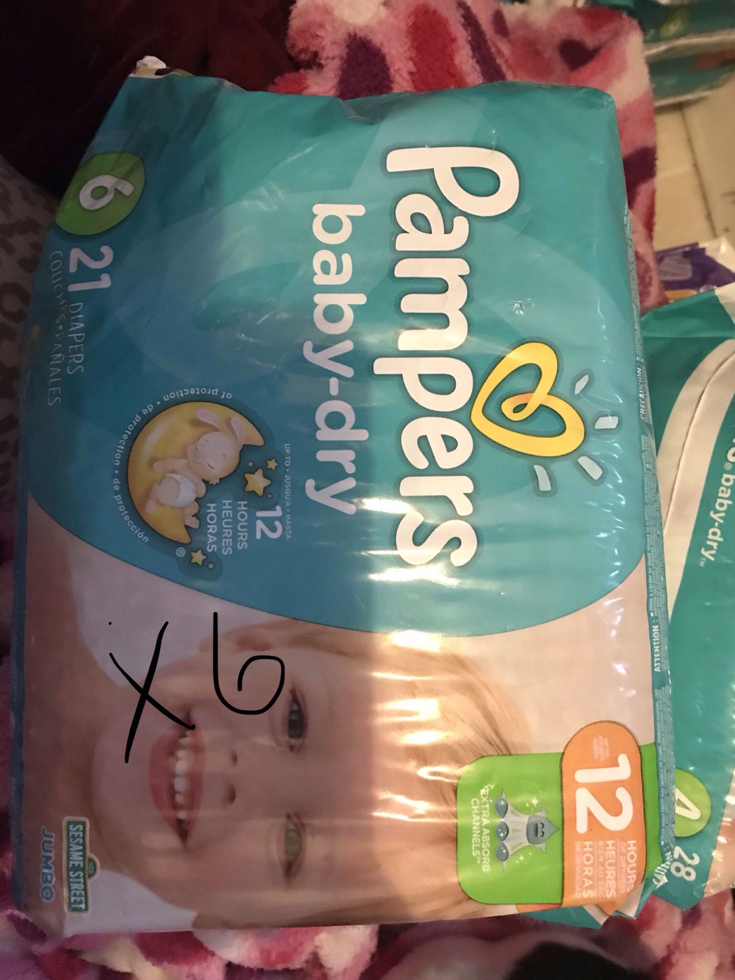 5 packs of size 6 pampers.