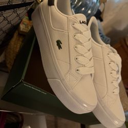 Lacoste white  sneakers 60 dls 