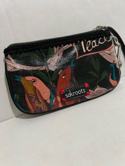 SAKROOTS wristlet. Approximately 4” x 7”. An excellent condition