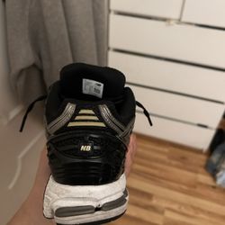 New balances size 9.5 silver and black 