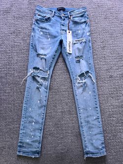 Ripped purple jeans
