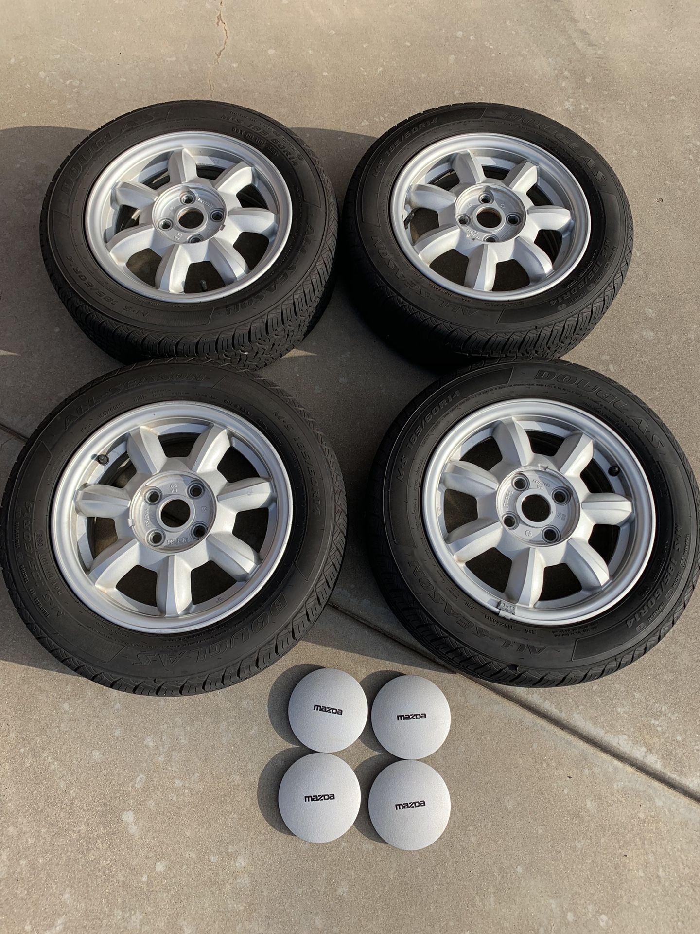 OEM daisy wheels from a 1992 Mazda Miata