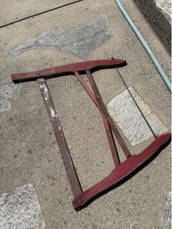 Antique wooden bow saw