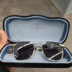 Gucci GG0287S Sunglasses with Case