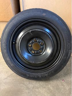 Brand new Mini Spare Tire 145/80R16