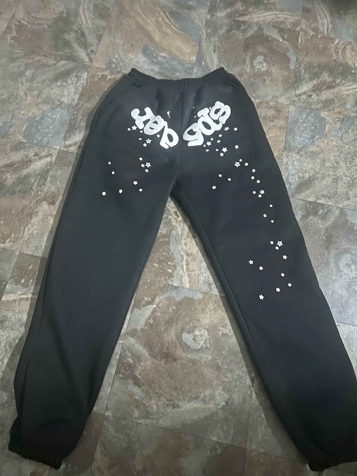 Black Sp5der hoodie pants