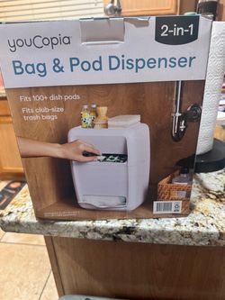 2-in-1 Bag & Pod Dispenser in white helps organize dish pods and trash bags. Easy-access slots make refilling and dispensing quick. Compact, durable d