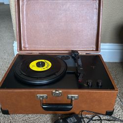Crosley CR49 Traveler (or "The Hopper") portable suitcase record player.