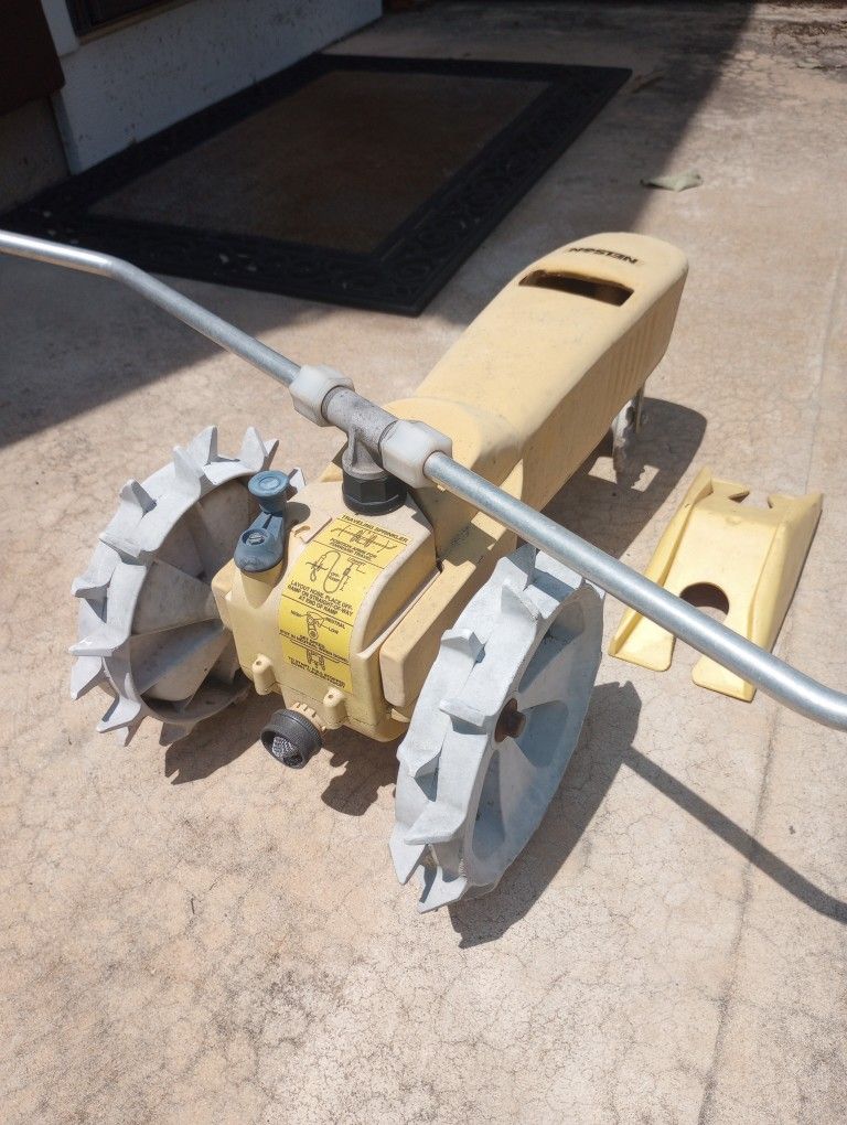 Walking Tractor Lawn Sprinkler.