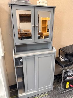 Gray Storage Cabinet with Mirrored Doors