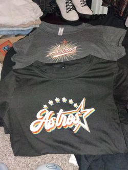 Two used vintage women's tshirts. In good used condition $20 for both or $12 a piece.