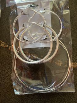 Brand new earrings gold and silver 3.00 the package